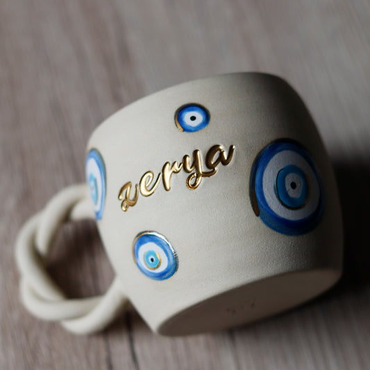 Personalisiert - Tasse in beige mit Nazar Motiven